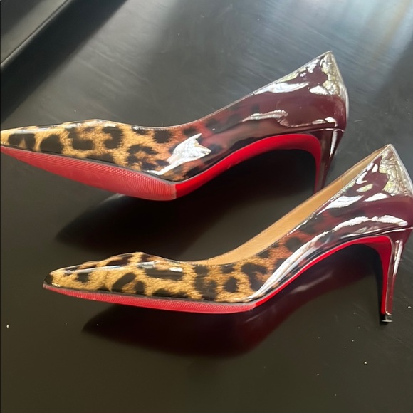 Christian Louboutin Leopard Print Pumps. Comes with shoe bag.